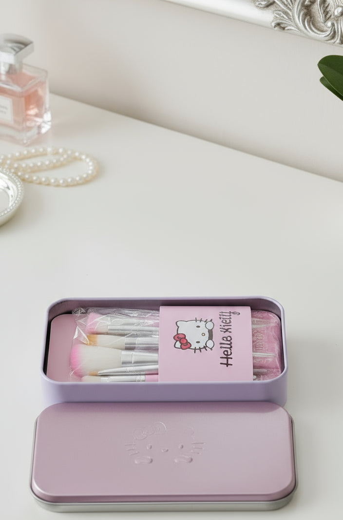 Set of utensils in a Hello Kitty-themed case on a light gray background