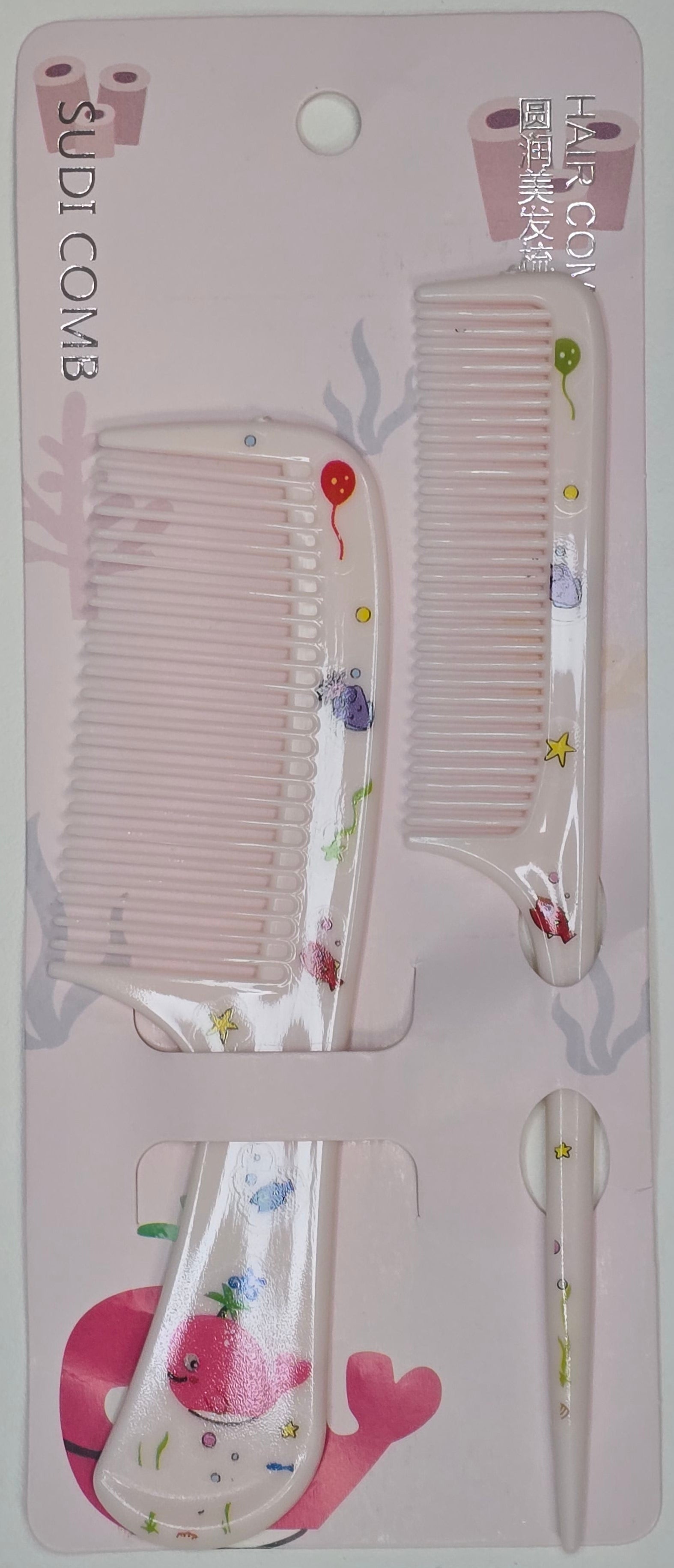 Set of hair combs on a pink card with cartoon designs